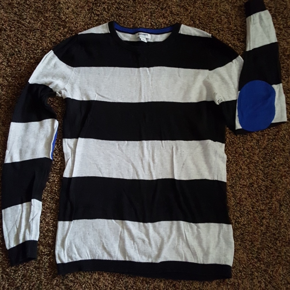 Black and White Striped shirt with Blue elbow pads